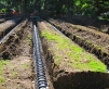 Pressurized drainfield for commercial system using infiltrator chambers